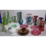 A collection of decorative coloured glass vases, bowls, decanters and sundry.