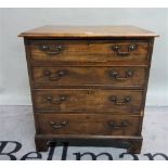 A late 18th century mahogany commode chest of four long graduated drawers on bracket feet,