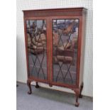 A pair of George III and later mahogany astragal glazed two door display cabinets,