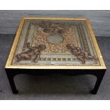 A 20th century square coffee table, polychrome painted with cherubs on a neo-classical background,