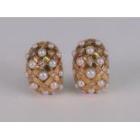 A pair of 18ct gold, cultured pearl and diamond set earclips, of bombé lattice design,
