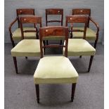 A set of six Regency brass inlaid mahogany dining chairs,