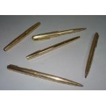 A group of Parker gold plated writing implements, comprising; a fountain pen, two ballpoint pens,