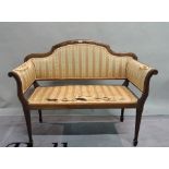 An Edwardian inlaid mahogany two seater sofa. 108cm wide x 85cm high.