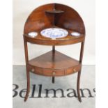 A George III mahogany corner washstand with single drawer undertier, 59cm wide x 106cm high.