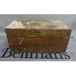 A late 19th century camphor wood trunk, with wrought iron carrying handles,