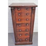 A Victorian mahogany Wellington chest, with seven long graduated drawersn enclosed by a locking bar,