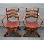 A pair of 19th century oak 'X' framed openarm side chairs, 55cm wide x 88cm high.