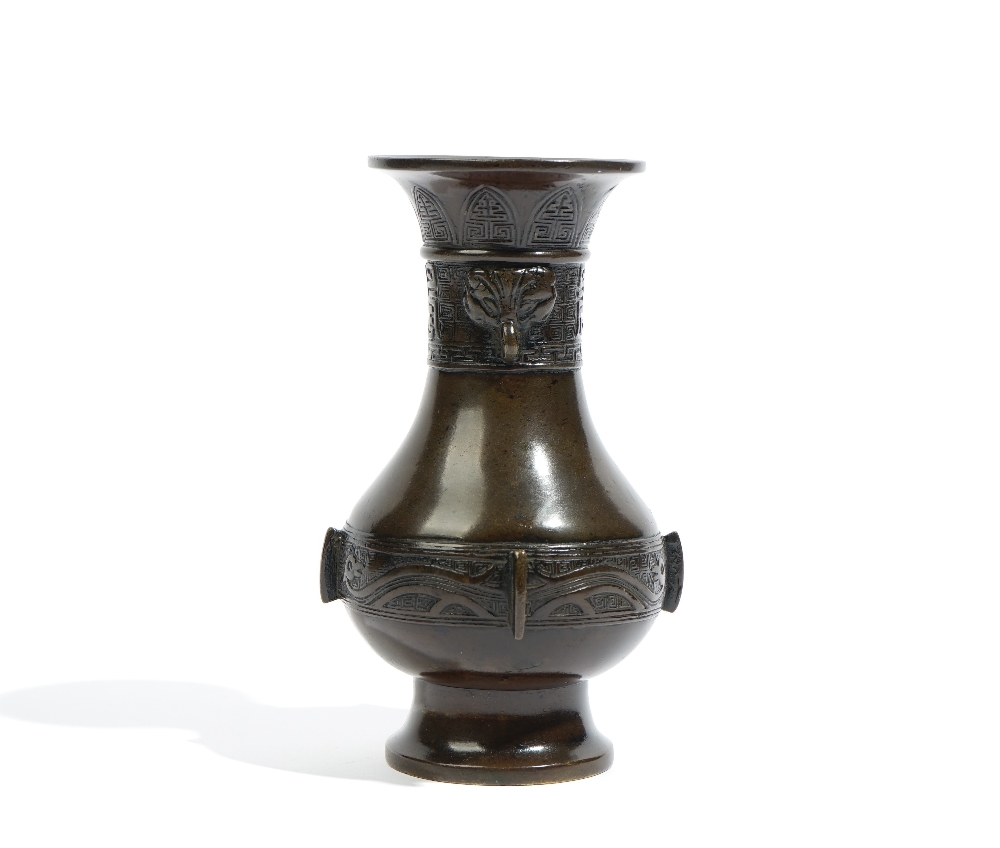 A small Chinese bronze vase, Xuande three character mark but later, of pear form, - Image 2 of 8