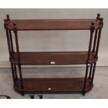 A Victorian style stained beech three tier hanging shelf, 87cm wide x 75cm high.
