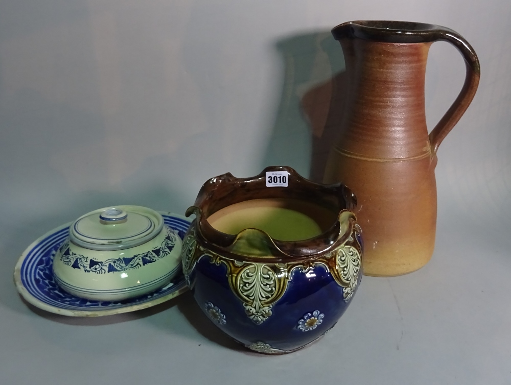 A Doulton jardinèire with blue glaze, 21cm high, a brown glaze studio pottery jug,