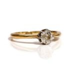A gold and diamond single stone ring, claw set with a cushion shaped diamond,