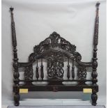 A modern Anglo Indian style barley twist carved four poster bed, 180cm wide (needs setting up).