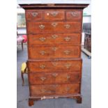 A George III feather and cross-banded walnut chest on chest with three short over six long