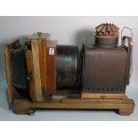 An early 20th century Coronet mahogany enlarging machine.