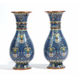A pair of Chinese cloisonné vases, 20th century, of slender pear form,
