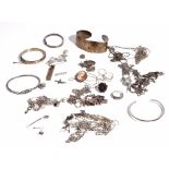 Mostly silver jewellery, comprising; five bangles, five pendants with neckchains,
