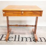A 19th century mahogany single drawer side table, dual ended supports united by turned stretcher,