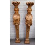 A pair of 19th century carved limewood caryatid mounts/jambs with relief carved floral swags,