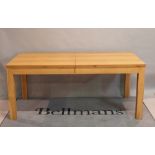 A modern oak triple section dining table,