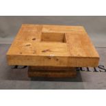 A modern oak square coffee table, on plinth base, 90cm wide x 40cm high.