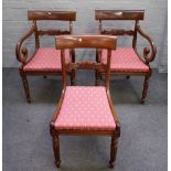 A set of eight George IV mahogany dining chairs with carved waist rail on reeded supports,