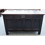 A late 17th century oak coffer, of panelled construction, with a gouged frieze,