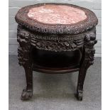 A late 19th century Chinese hardwood jardiniere stand,