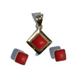 A pair of gold and coral earstuds, each of square form with post fittings,