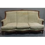 A Louis XVI style stained beech three piece suite comprising a serpentine sofa,