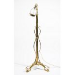 An Art Nouveau brass standard lamp,