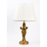 A French gilt metal candlestick, late 19th century, converted to a table lamp,