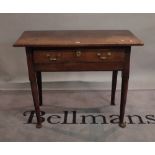 An 18th century oak single drawer side table on turned supports and pad feet,