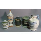 A group of five early 20th century ceramic apothecary jars and a European ceramic ewer,