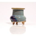 A small Jun type tripod vase, squat form with cylindrical neck and everted rim, 9.5cm. high.