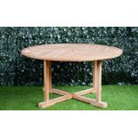 A hardwood circular garden table, of slatted construction, on folding X-frame base, 150cm diameter.