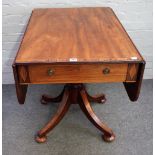 A Regency style mahogany rosewood crossbanded boxwood strung supper table, with hinged drop leaves,