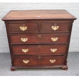 A mid-18th century mahogany banded oak chest of two short and two long graduated drawers,
