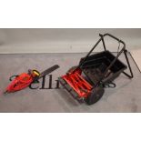 A Sterling clipper push mower and Sovereign electric hedge trimmer.