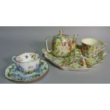 A Chintzware six piece tea set in the fireglow pattern and a Meissen style cup and saucer (2).