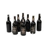 Eight bottles of Dow's 1977 vintage Port.