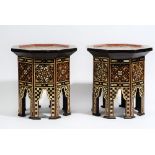 A pair of small Ottoman style octagonal occasional tables, each inlaid with mother-of-pearl, 32cm.