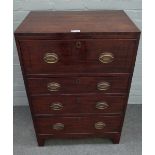 A George III inlaid mahogany chest with four long graduated drawers on bracket feet,