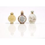 A group of three Chinese snuff bottles, 20th century, comprising; a porcelain bottle,