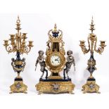 An Louis XVI style gilt metal mounted clock garniture, 20th century,