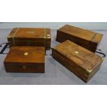 A group of four 19th century mahogany and brass bound writing slopes,
