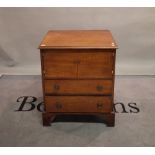 A late George III mahogany commode chest over two drawers on bracket feet, 64cm wide x 75cm high.