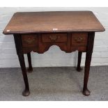 An 18th century oak lowboy, with three frieze drawers on club supports, 76cm wide x 70cm high.