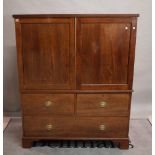 A George III mahogany linen press over two short and one long drawer, 125cm wide x 155cm high.