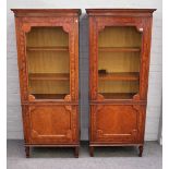 A pair of 19th century floral marquetry inlaid satinwood display cabinets,